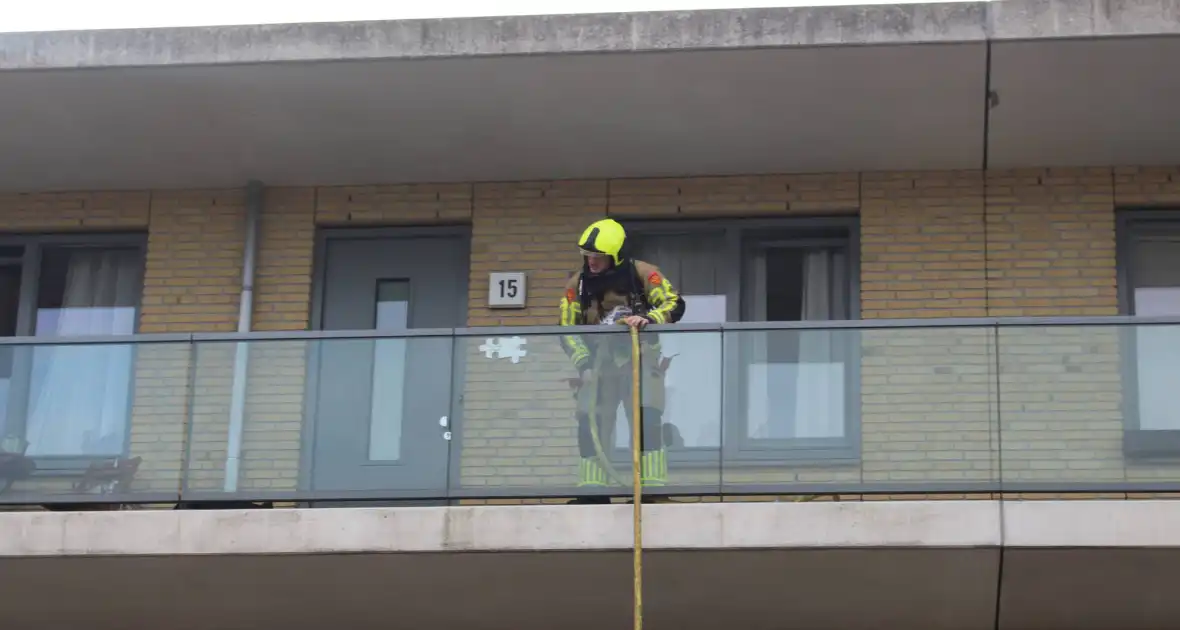 Bewoner gewekt nadat brandweer deur openramt wegens vergeten pannetje - Foto 5