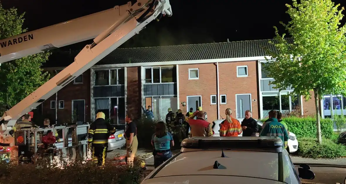 Arrestatieteam haalt brandstichter uit woning - Foto 5