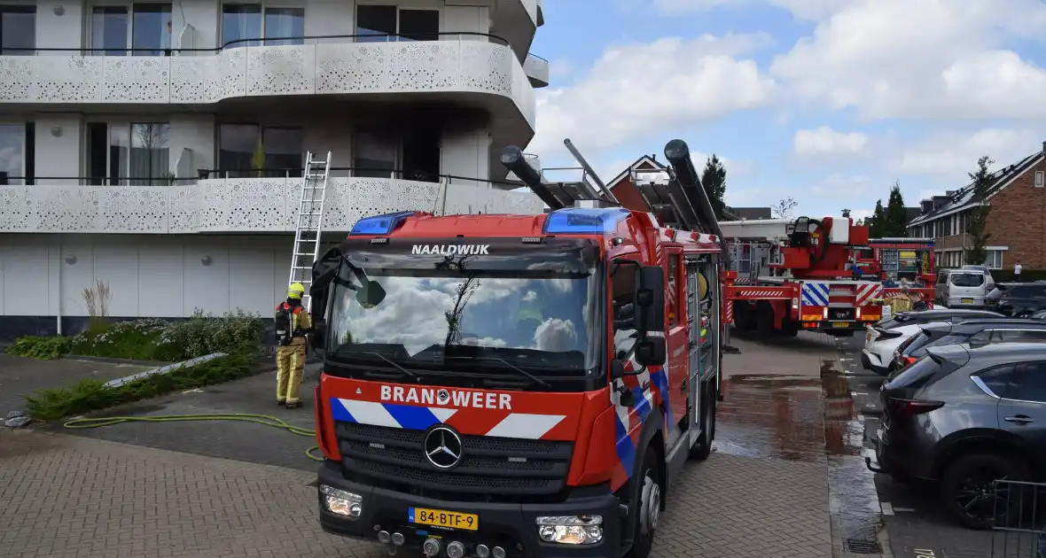 Zwarte rook trekt uit flatwoning - Foto 5