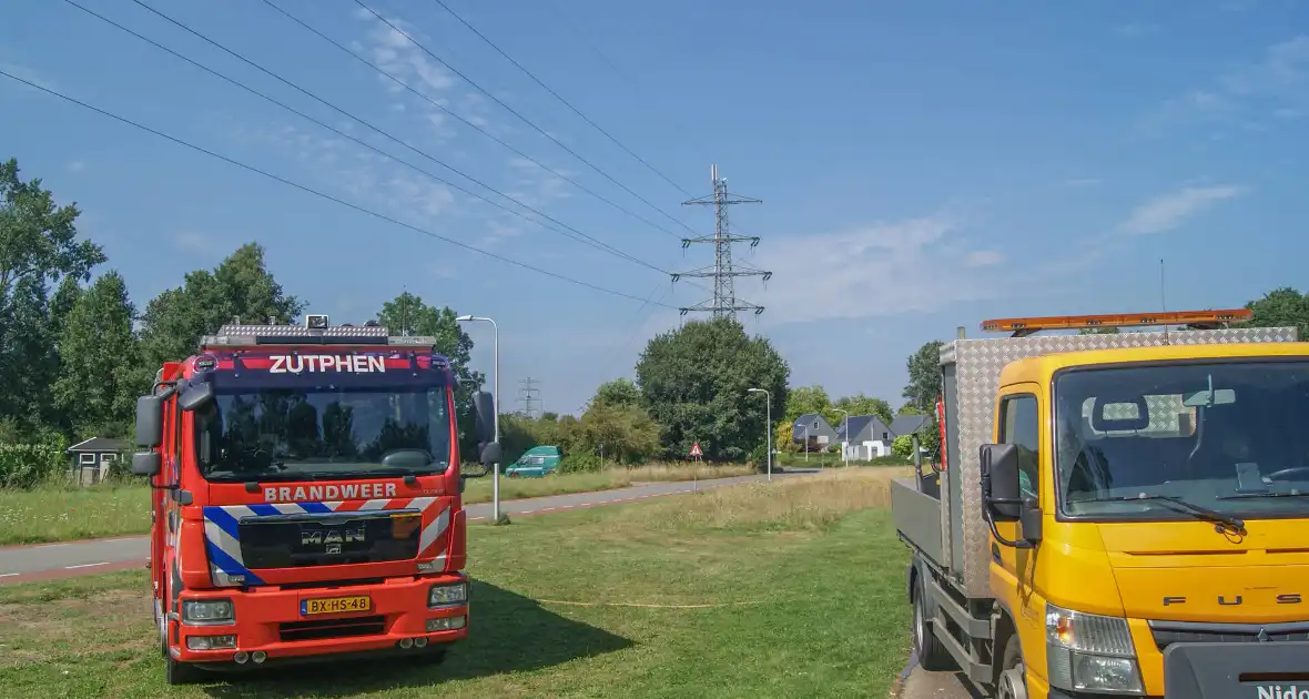 Brandweer in actie voor brandende band - Foto 1