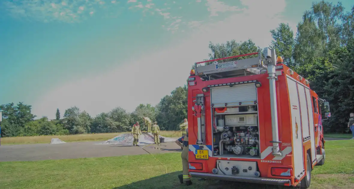 Brandweer in actie voor brandende band - Foto 4