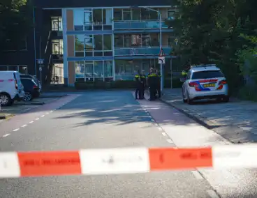 Aanhouding bij inval en onderzoek naar incident bij flat