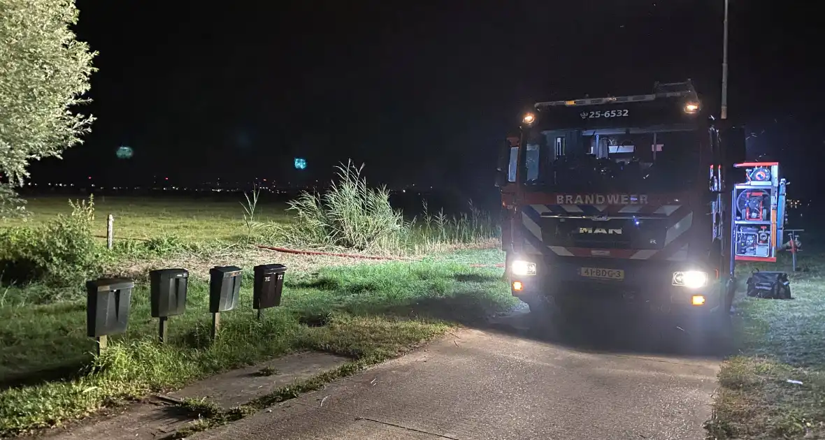 Rookontwikkeling bij brand in landbouwvoertuig - Foto 3