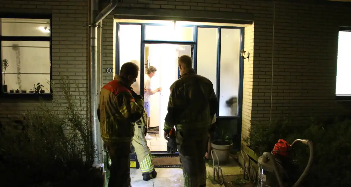 Wateroverlast in woning na gesprongen leiding - Foto 1