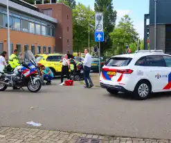 Vrouw in scootmobiel gewond op straat