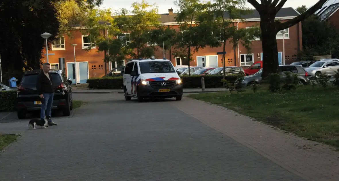 Politie doorzoekt auto en woning - Foto 4