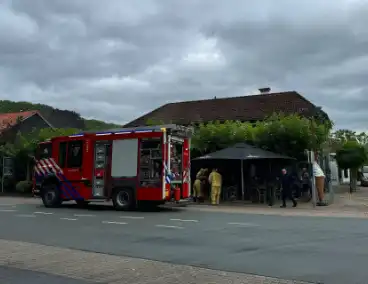 Forse rookontwikkeling door brand in keuken van eetcafe