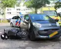 Automobilist schept scooterrijder