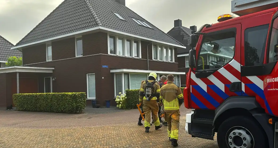 Rookmelder gaat af na val partij in woning - Foto 1