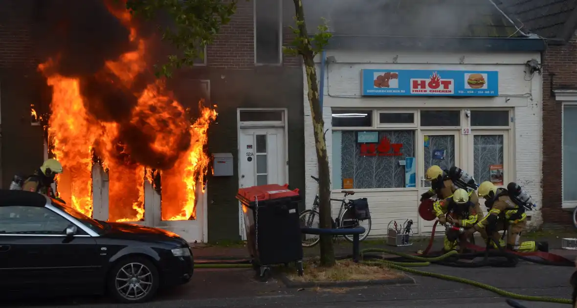 Grote uitslaande brand in pizzeria