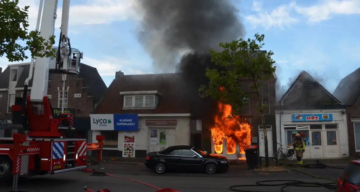 Grote uitslaande brand in pizzeria - Foto 8