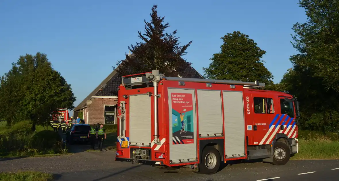 Brand in grasmaaier in woonboerderij