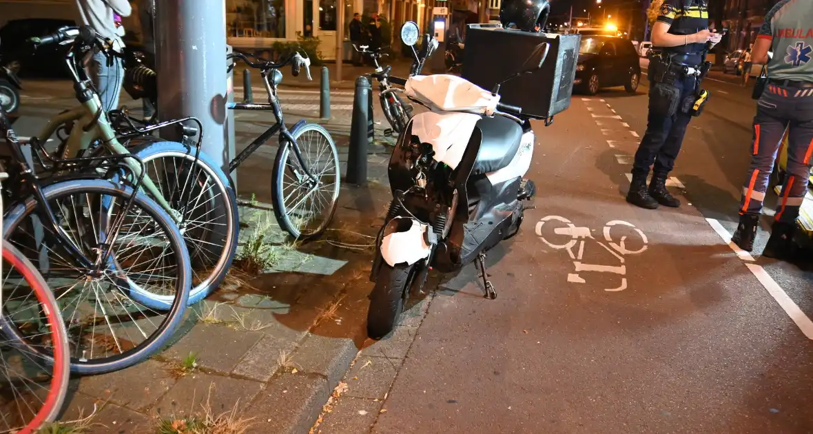 Maaltijdbezorger gewond bij botsing met concurrent - Foto 6