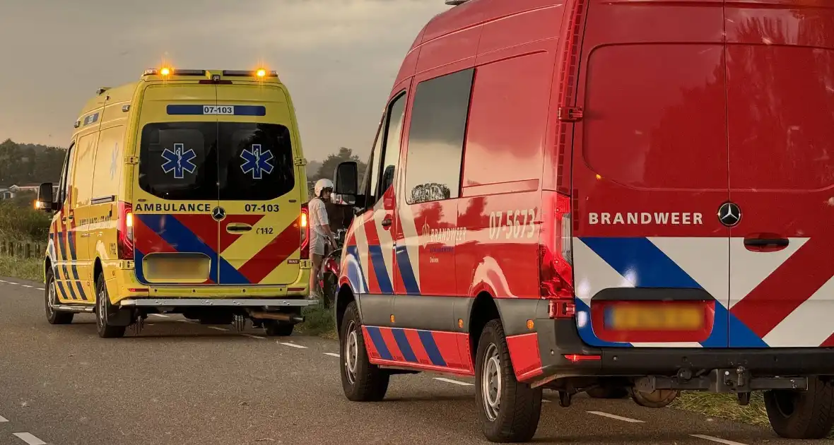 Persoon valt van fiets door wind - Foto 1