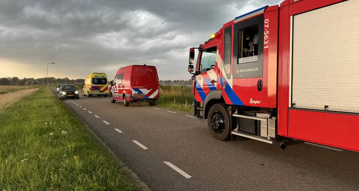 Persoon valt van fiets door wind - Foto 3