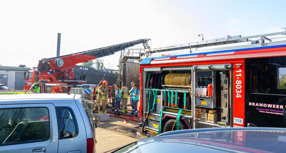 Brand op schip dat voor reparatie ligt in Dok - Foto 5