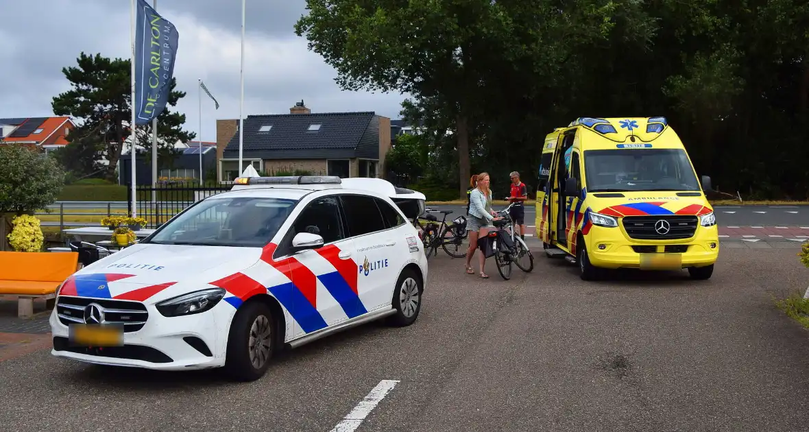 Persoon op fiets aangereden door personenauto - Foto 3