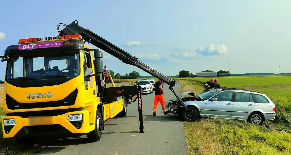 Auto belandt in sloot, bestuurder spoorloos - Foto 6