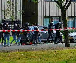 Politie valt woning binnen na schietpartij, verdachte aangehouden