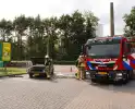 Golf cabrio vat vlam bij benzinepomp