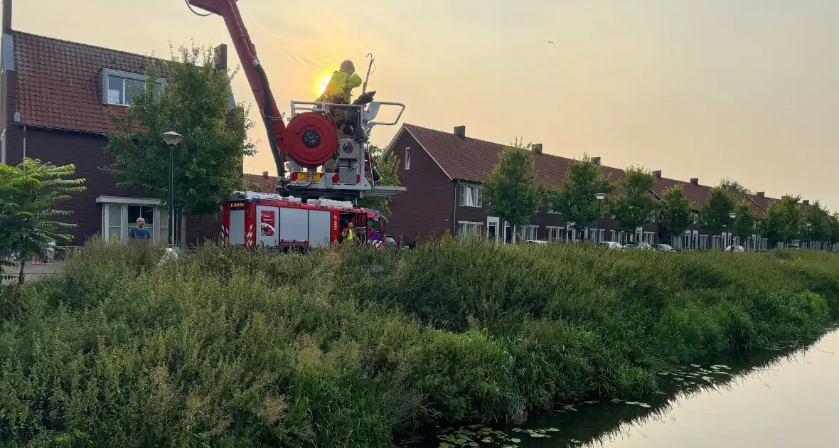 Brandweer assisteert politie en vist zak uit het water - Foto 8