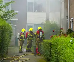 Uitslaande woningbrand door wasmachine