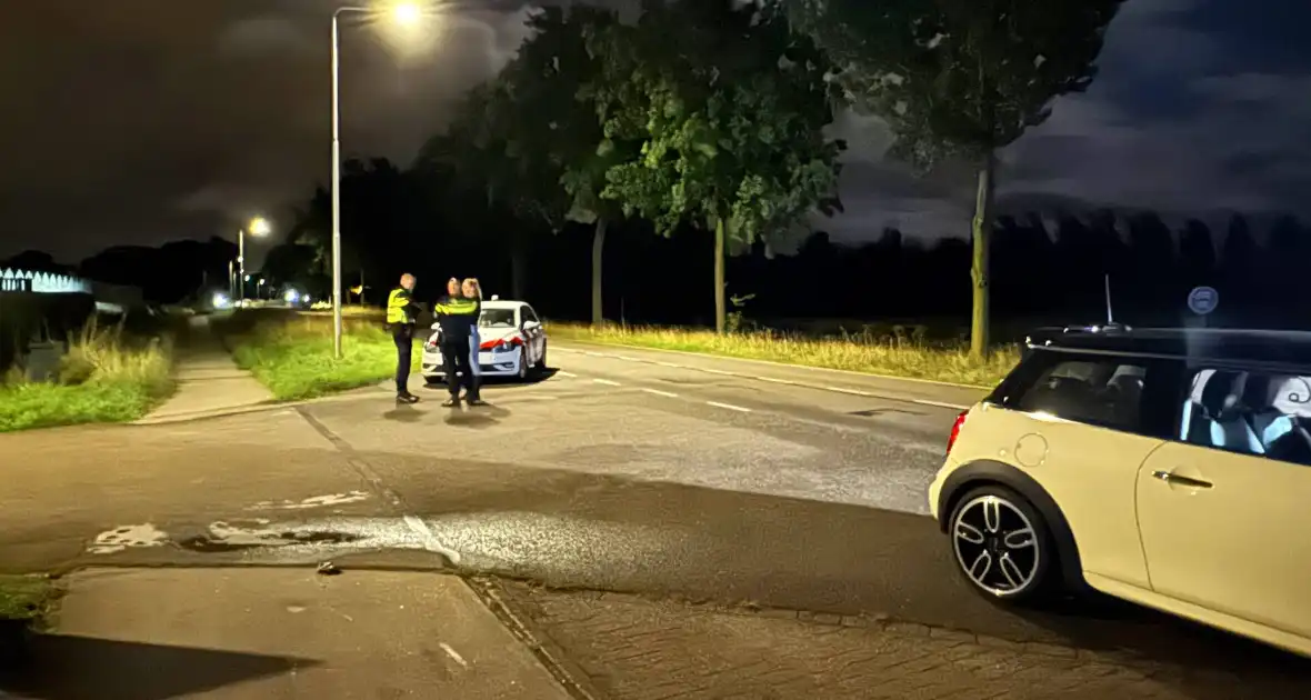 Mini Cooper zwaar beschadigd bij ongeval - Foto 2