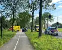 Twee scooters met elkaar in botsing op kruising