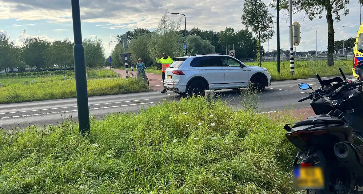 Twee scooters met elkaar in botsing op kruising - Foto 4