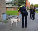 Politie druk met loslopende hond van beschonken bewoner