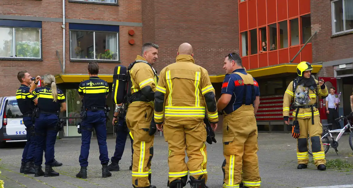 Rookontwikkeling op vijfde verdieping door keukenbrand - Foto 2
