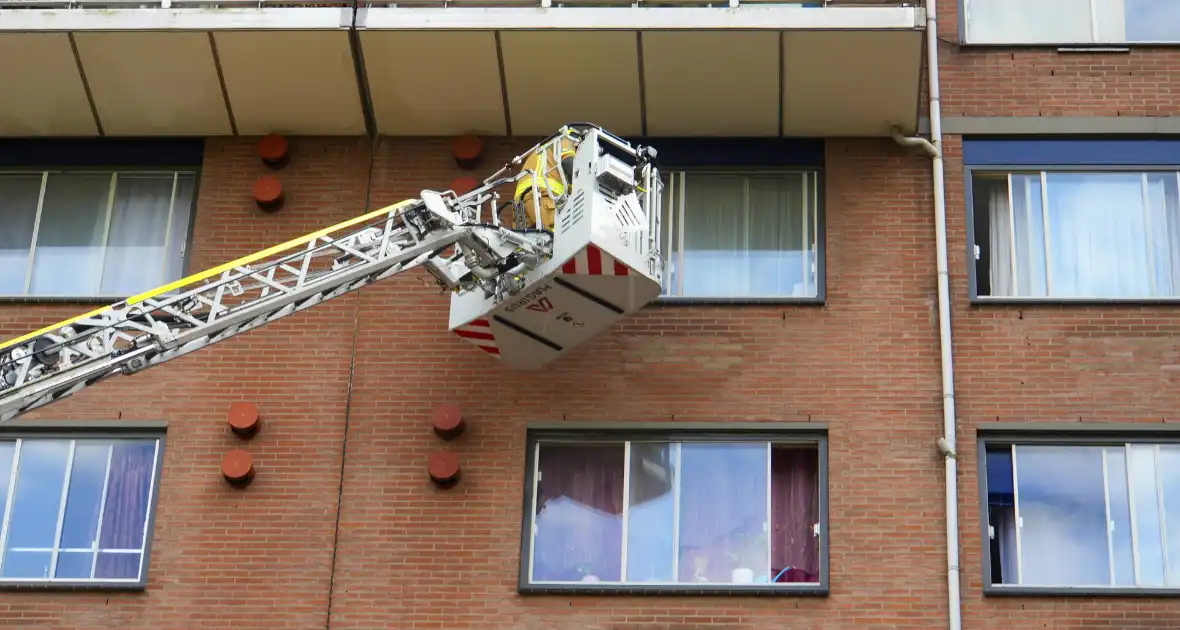 Rookontwikkeling op vijfde verdieping door keukenbrand - Foto 5