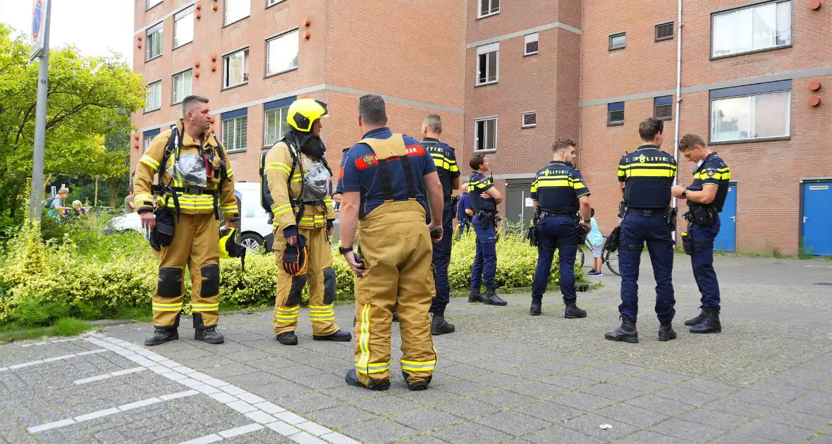 Rookontwikkeling op vijfde verdieping door keukenbrand - Foto 6