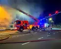 Forse rookontwikkeling bij uitslaande brand bij leegstaand pand