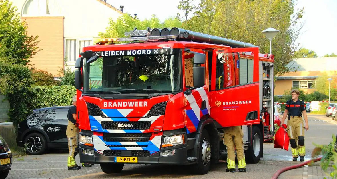 Flinke schade aan garage door scooterbrand - Foto 5