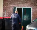 Forensische opsporing en brandonderzoek doen onderzoek naar brand in opvanglocatie