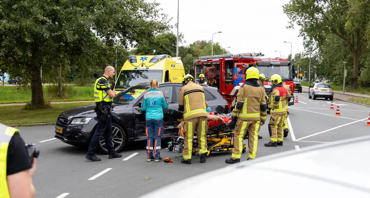 Brandweer bevrijdt beknelde automobilist - Foto 10
