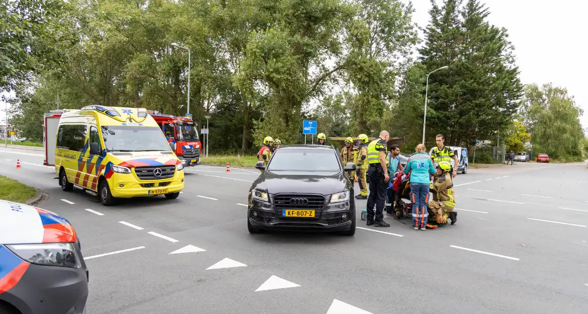 Brandweer bevrijdt beknelde automobilist - Foto 11