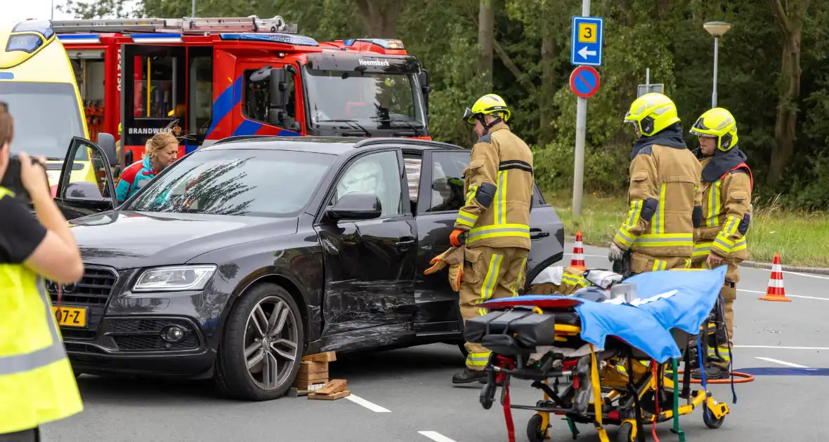 Brandweer bevrijdt beknelde automobilist - Foto 7