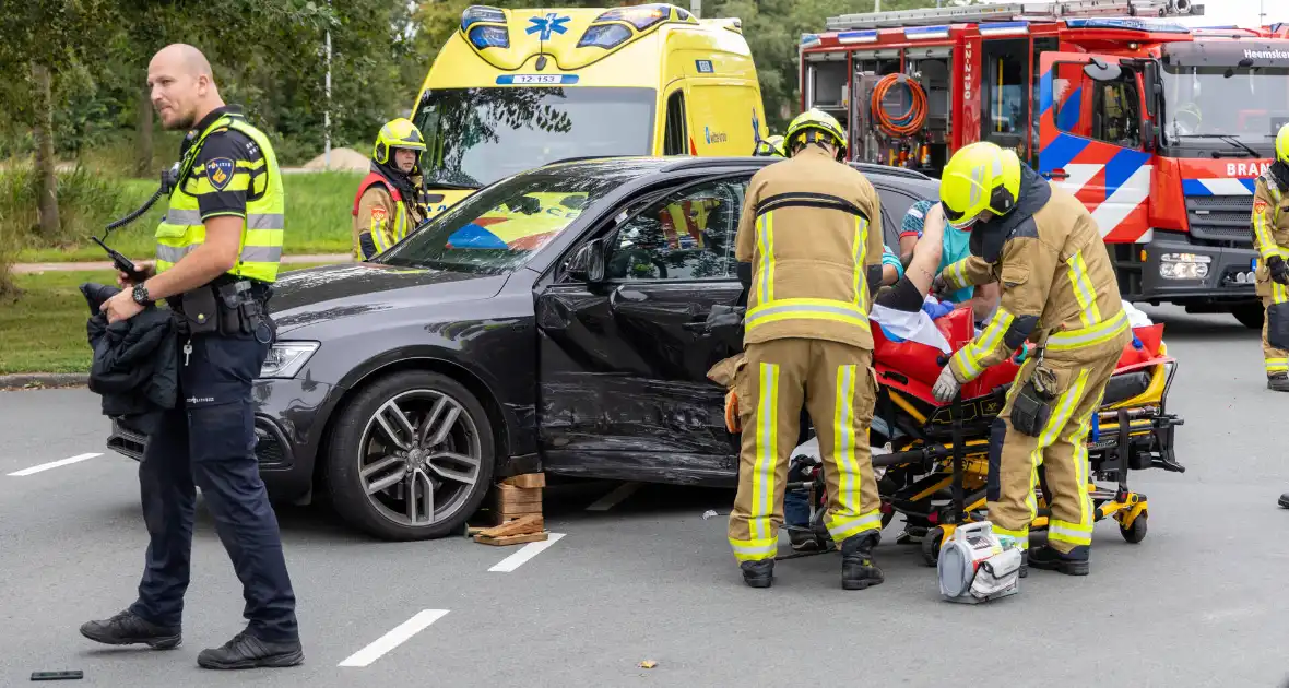 Brandweer bevrijdt beknelde automobilist - Foto 8