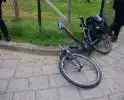 Fiets kapot na botsing met auto