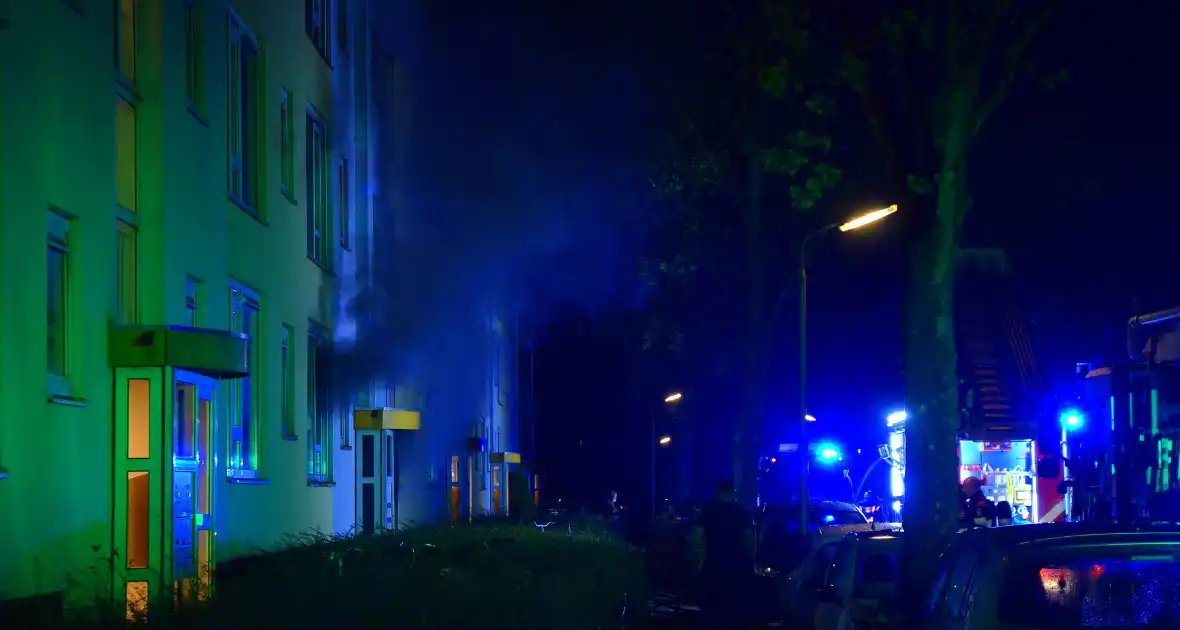 Gewonden bij portiekbrand - Foto 1