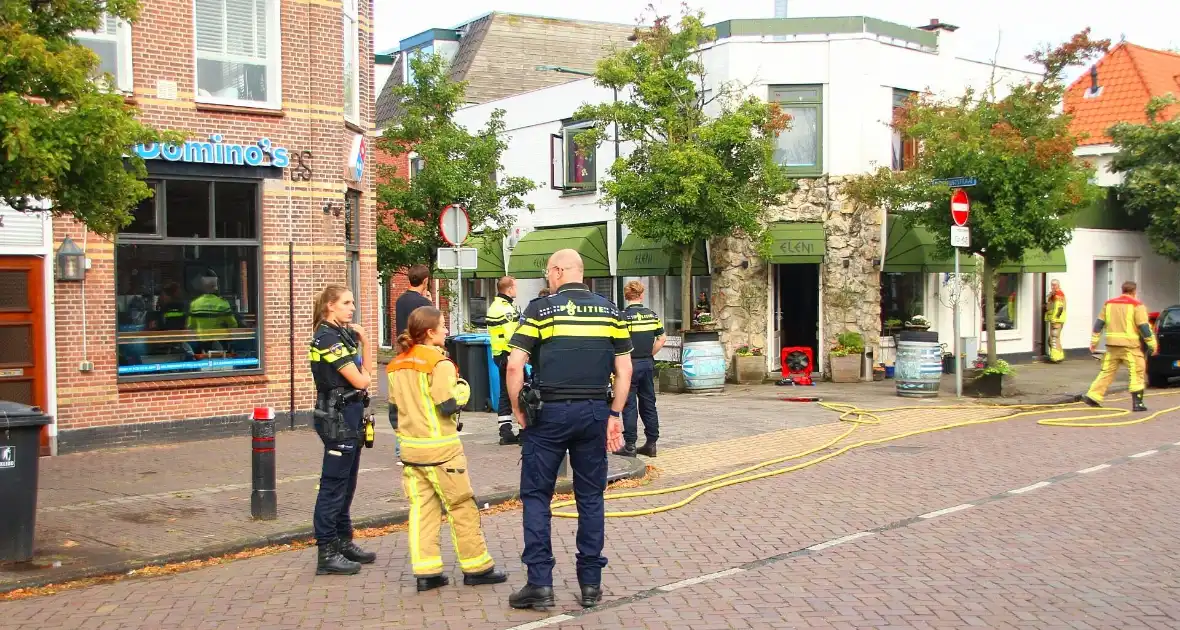 Brand in Grieks restaurant snel onder controle - Foto 7