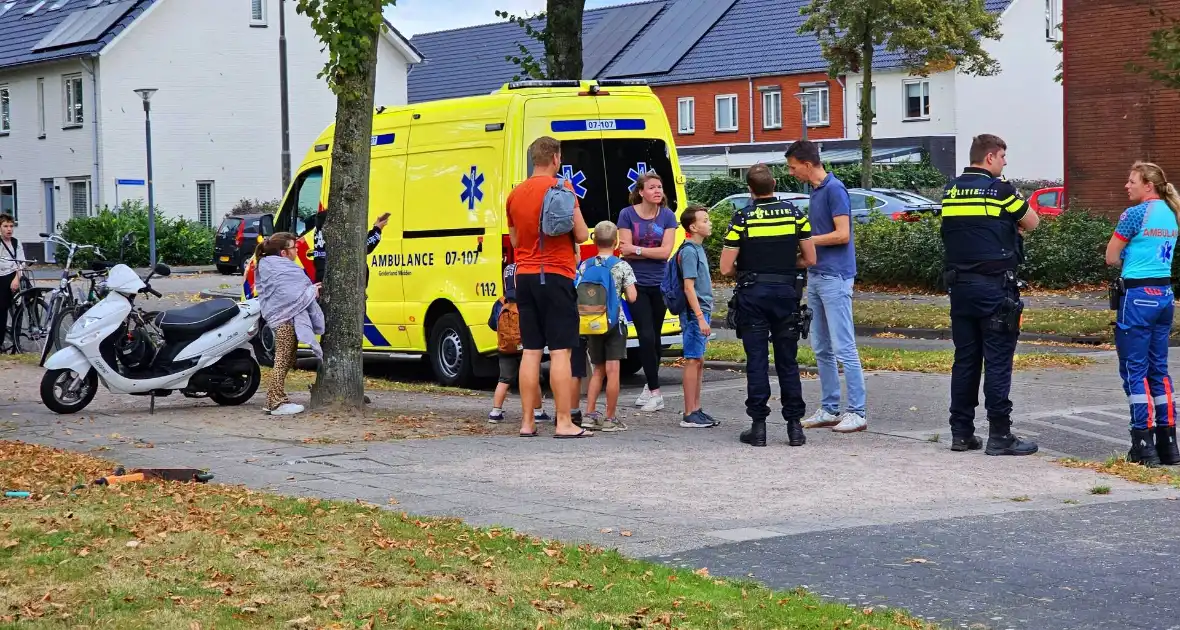 Scooter onderuit door losliggende tegels - Foto 2