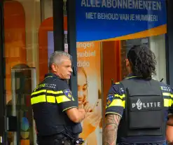 Overval op telefoonwinkel daders dreigen met vuurwapen