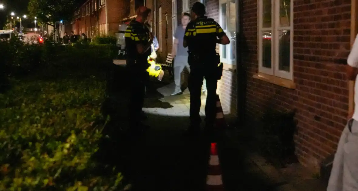 Onderzoek naar brand tegen voordeur woning - Foto 4