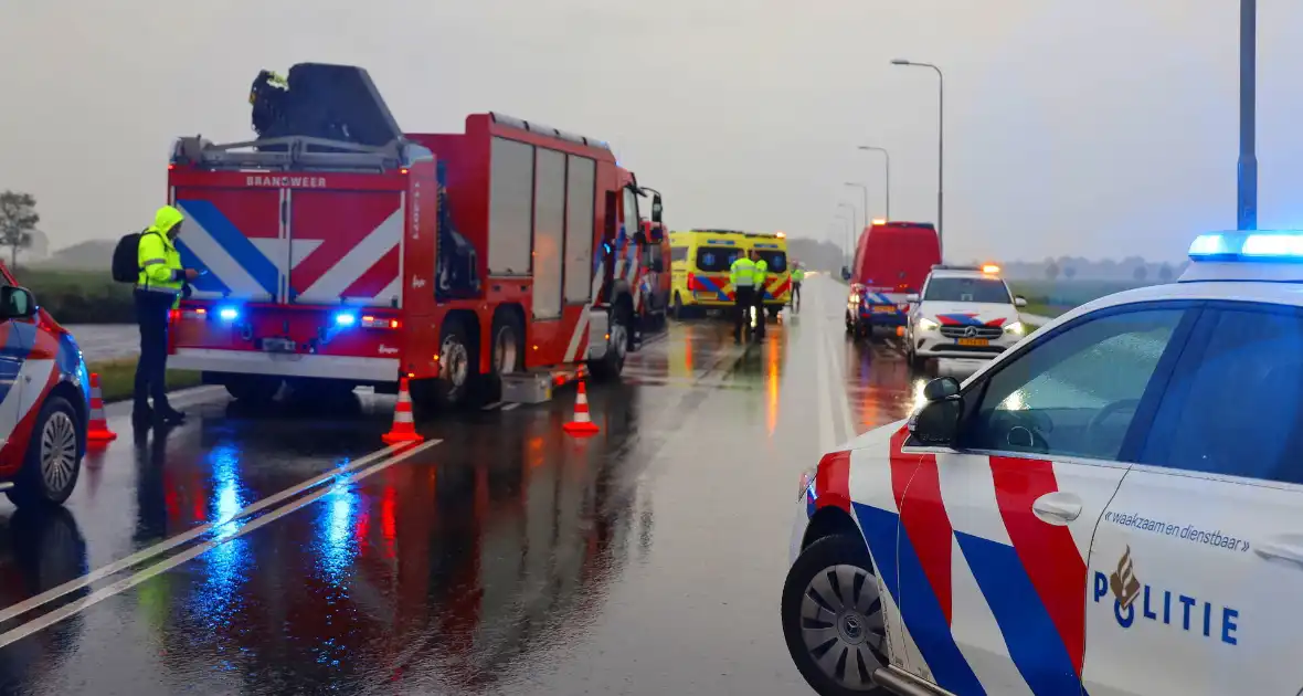 Omstanders verrichten heldendaad en redden te water geraakte automobilist - Foto 4