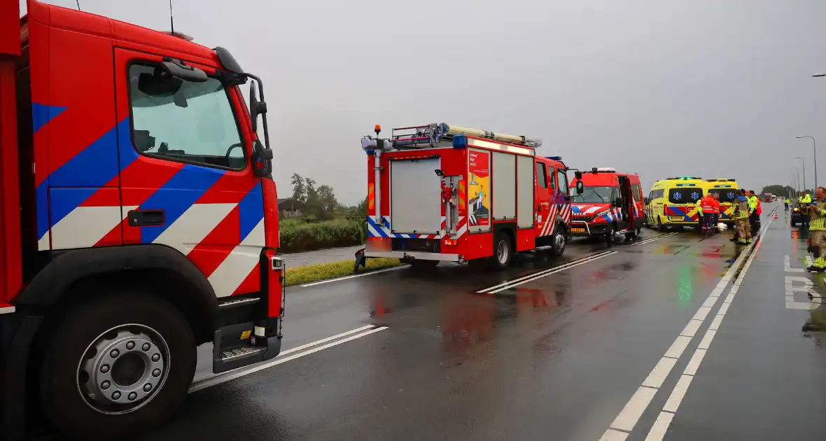 Omstanders verrichten heldendaad en redden te water geraakte automobilist - Foto 6