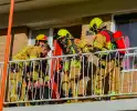 Brand in keuken in flatwoning snel onder controle