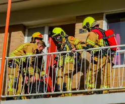 Brand in keuken in flatwoning snel onder controle